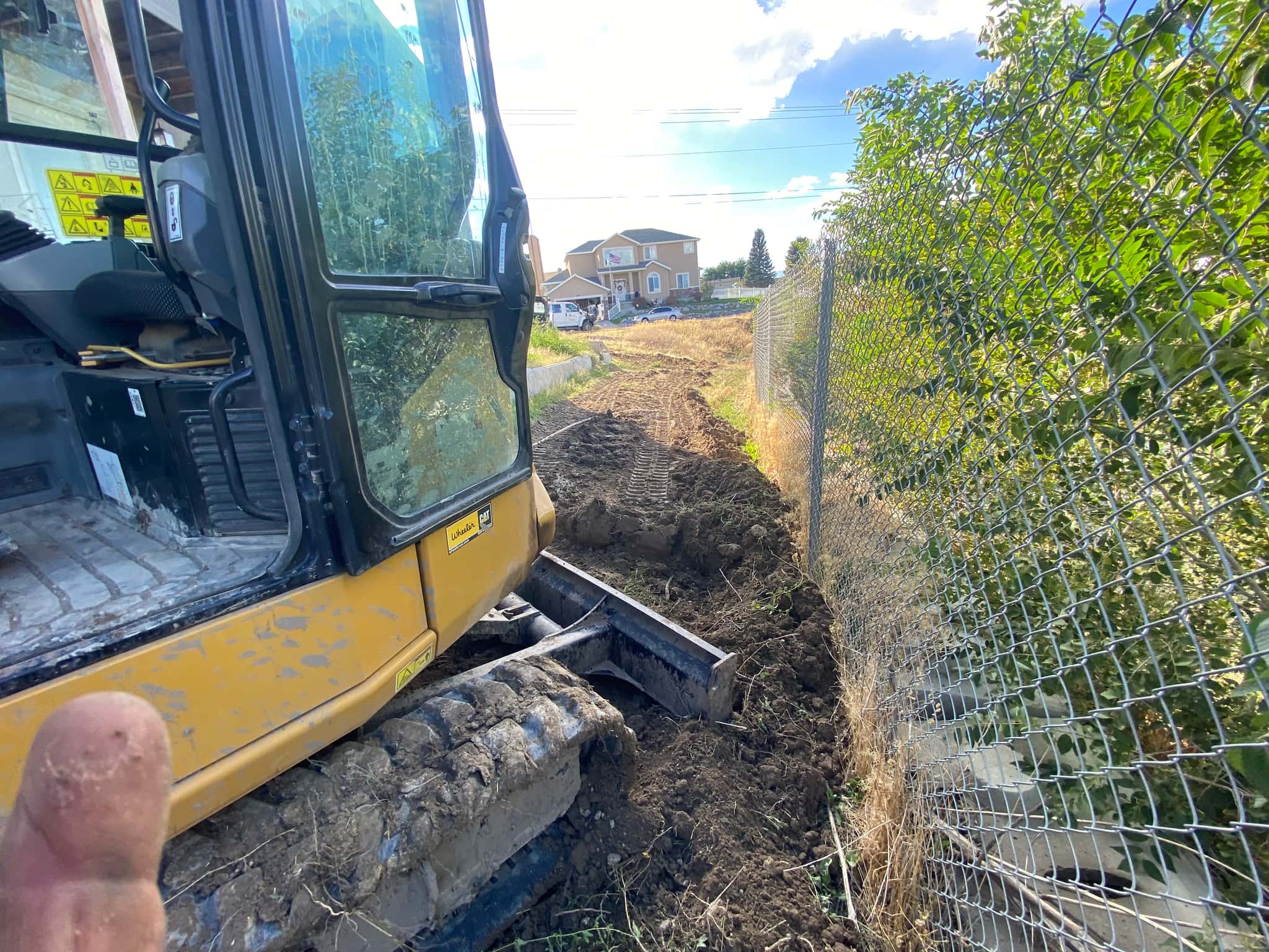 BEFORE: Raw excavation site showing initial digging and site preparation