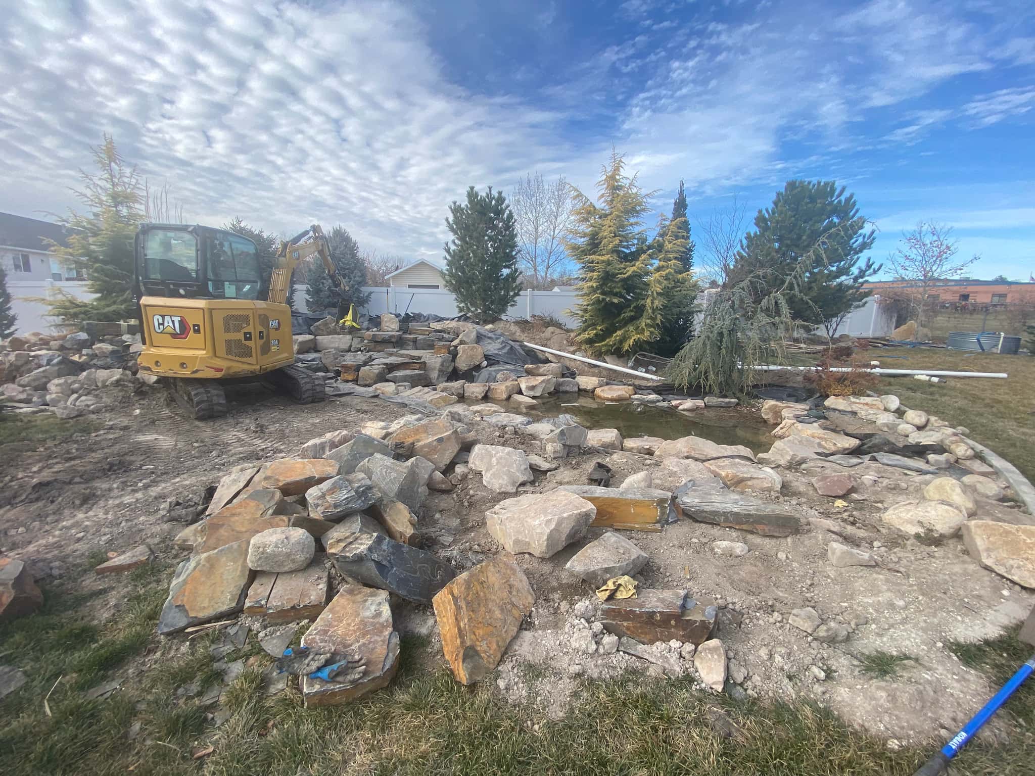 Final construction phase with water feature completion