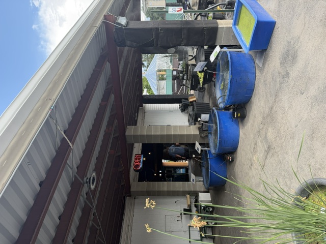 Utah Water Gardens store entrance with outdoor fish display tubs