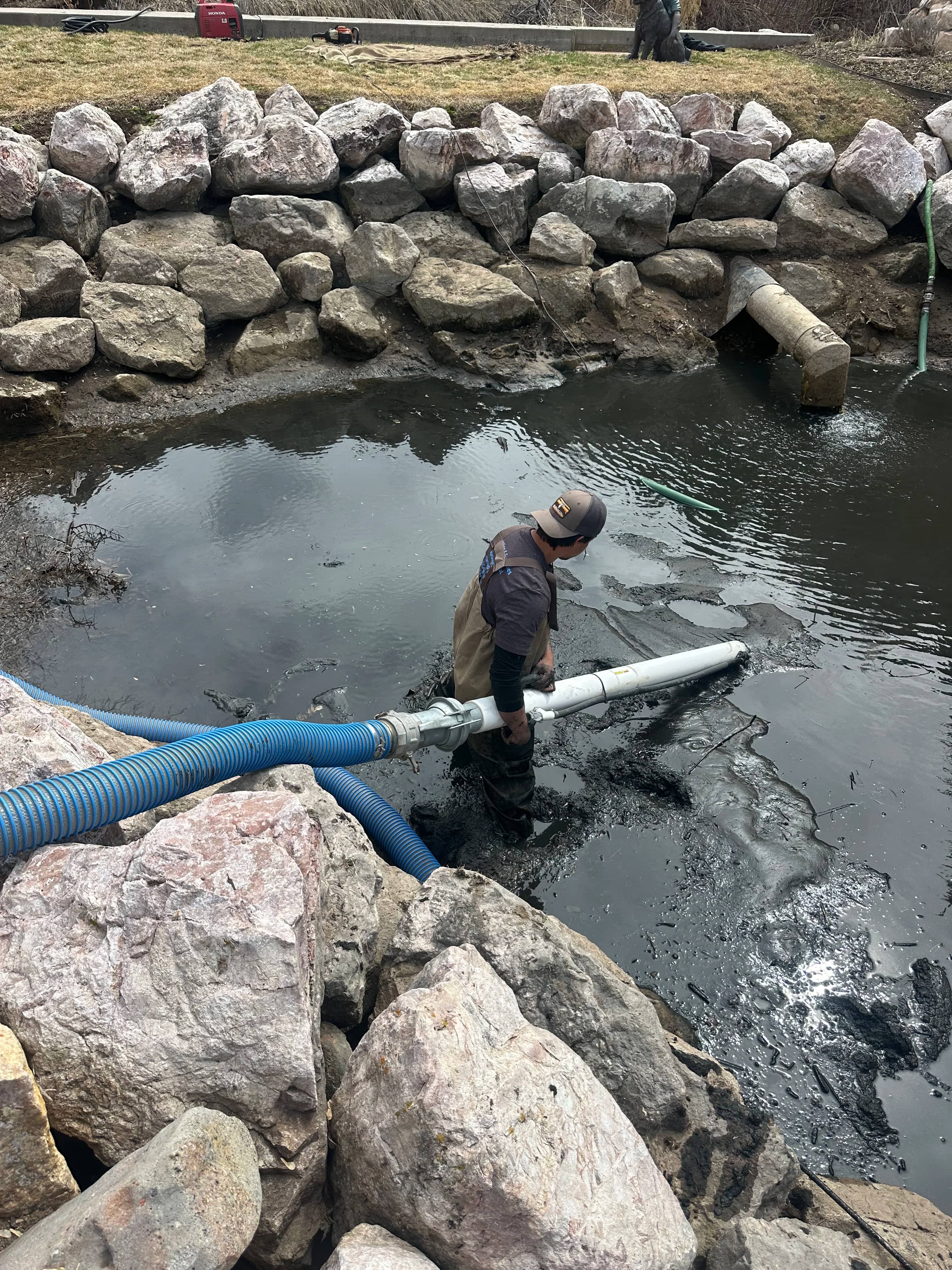 Professional pond vacuum setup for koi pond deep cleaning