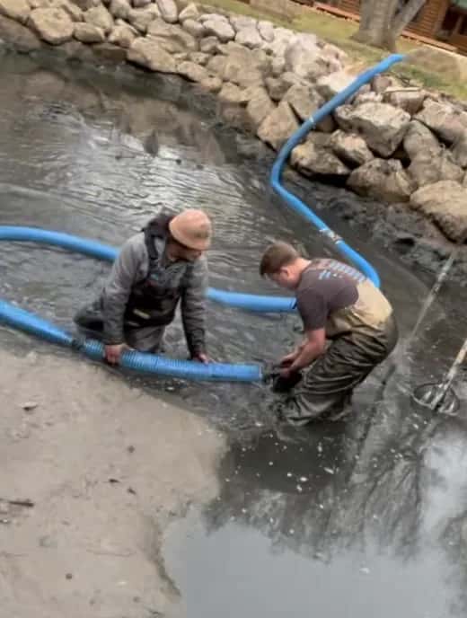 Pond vacuuming and cleaning tools used for koi pond maintenance