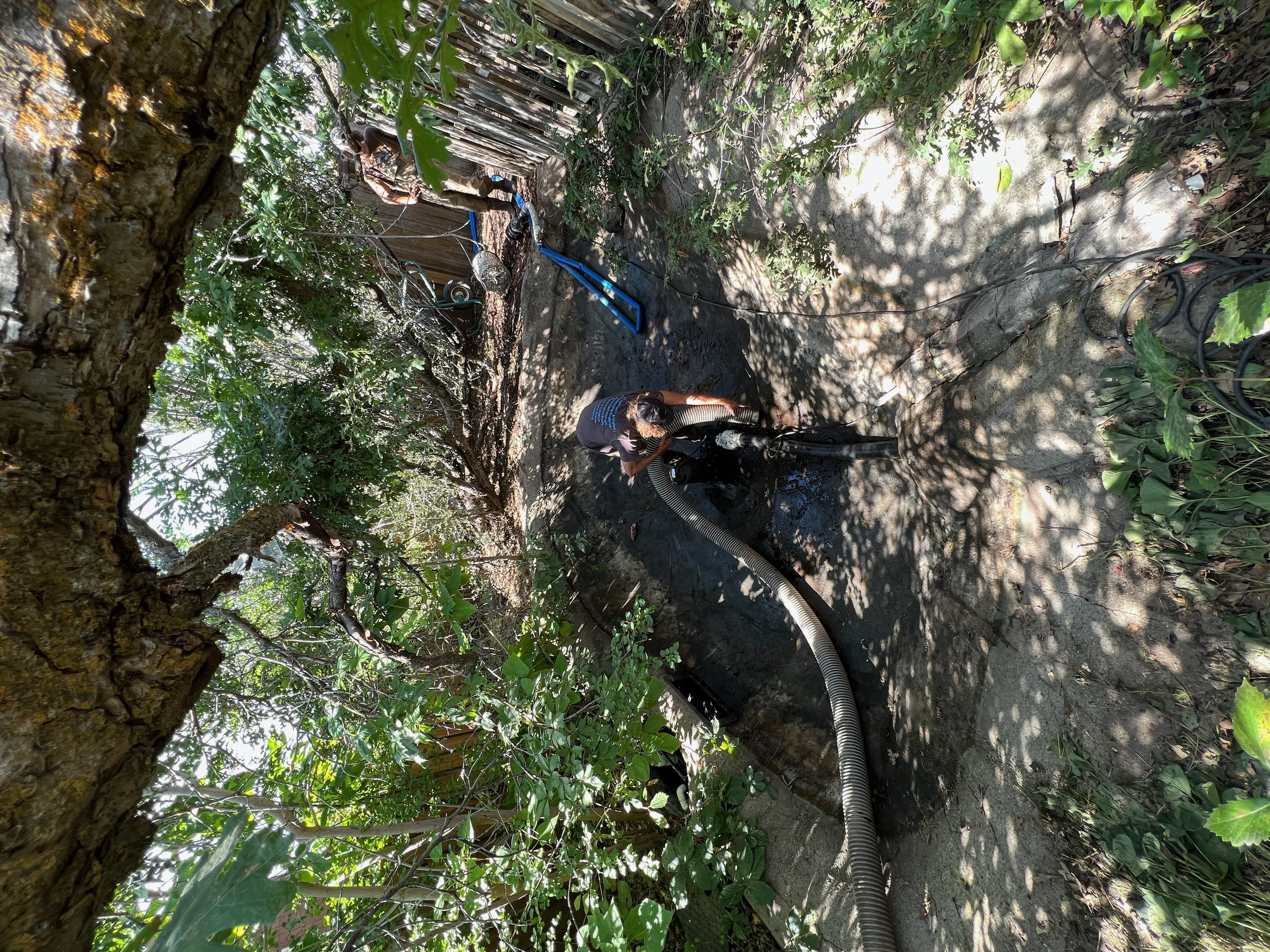 Pond vacuum service in Utah removing bottom muck without draining