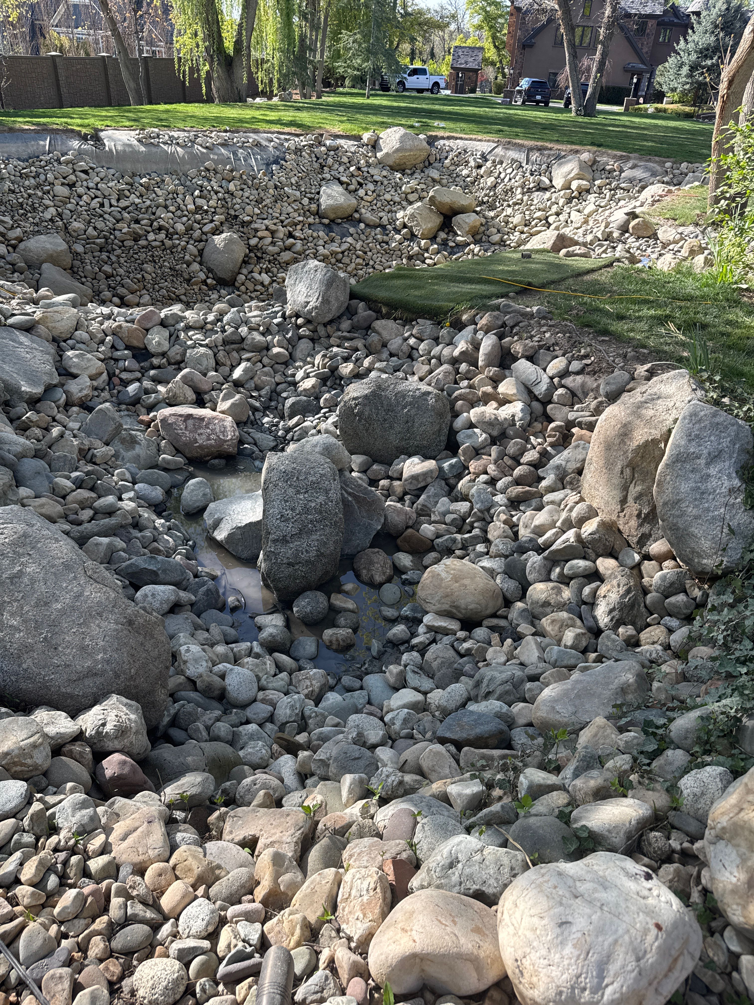 Rock-lined Utah pond fully drained and cleaned by our crew